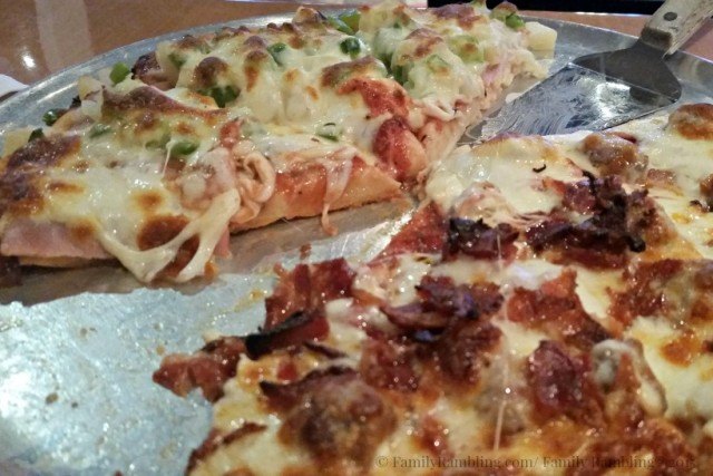 Pizza at The Other Place Sports Bar in Clear Lake, Iowa. Half Hawaiian, half All Meat Supreme.