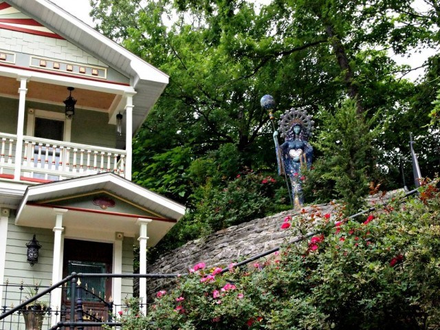 The stately Victorian houses share space with quirky works of art in Eureka Springs. Vacation in Arkansas.
